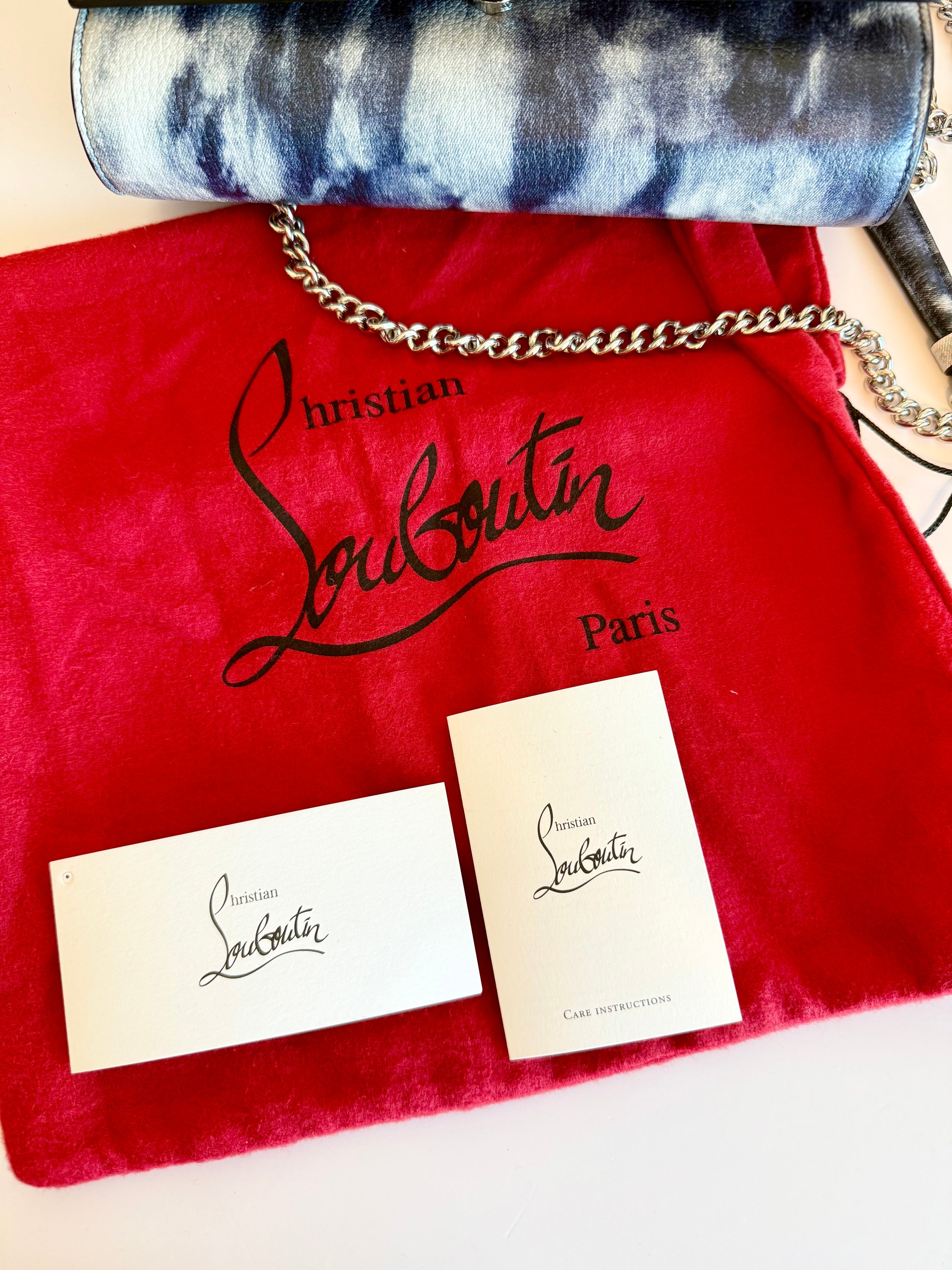 CHRISTIAN LOUBOUTIN
Calfskin Printed Punk Spikes Paloma Clutch