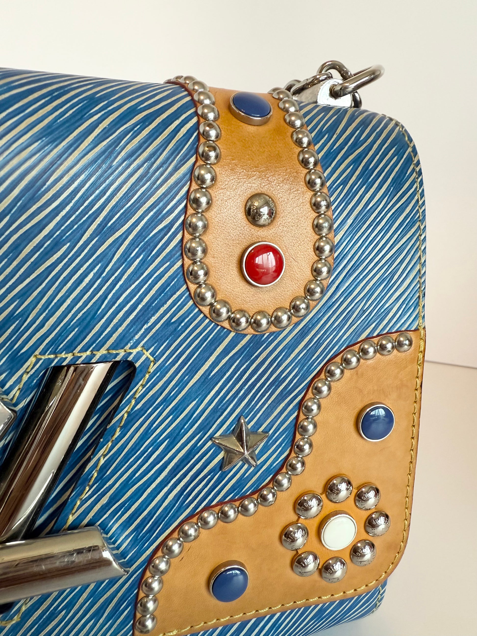 Louis Vuitton epi and vachetta crossbody twist lock