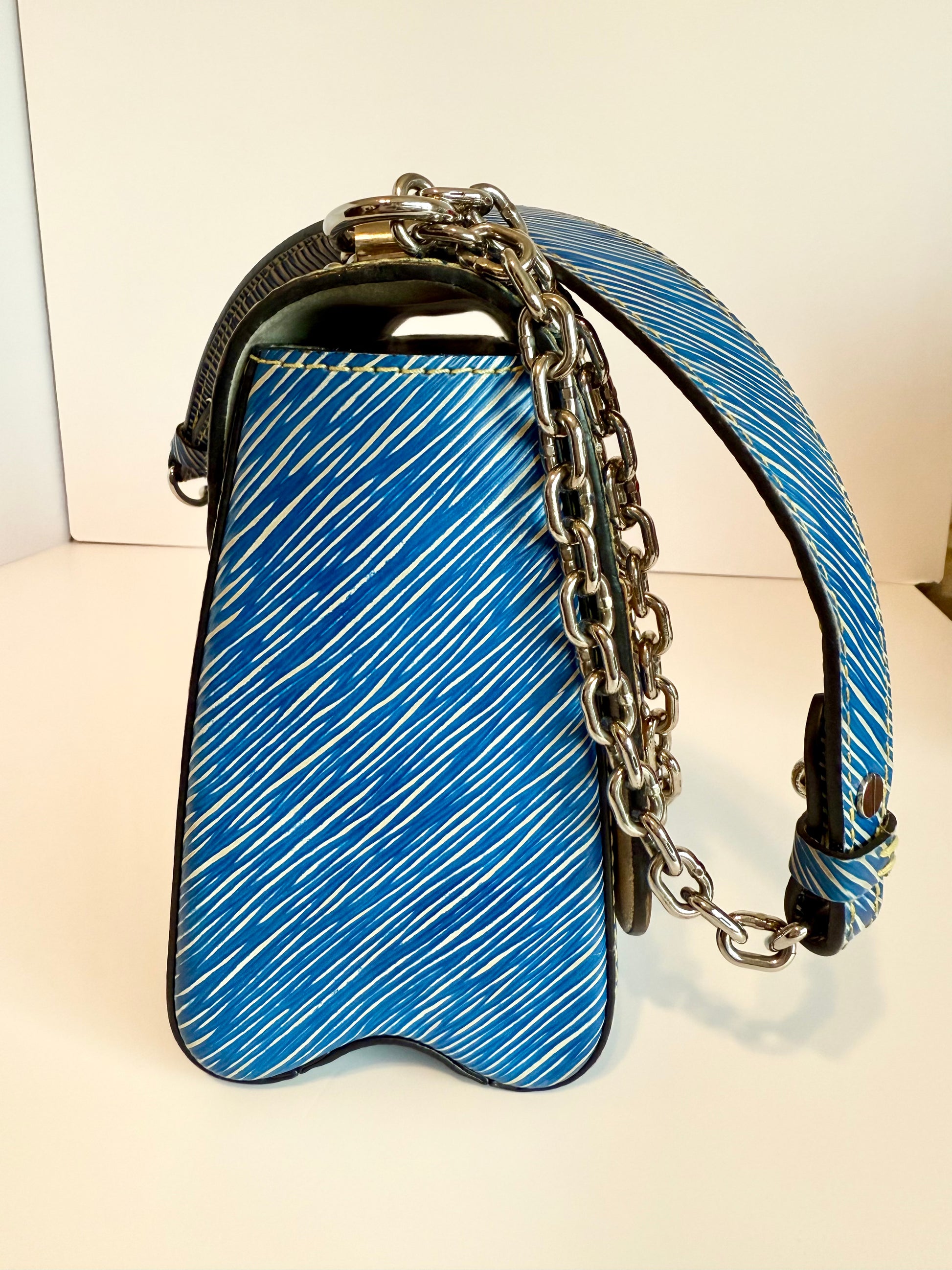 Louis Vuitton epi and vachetta crossbody twist lock