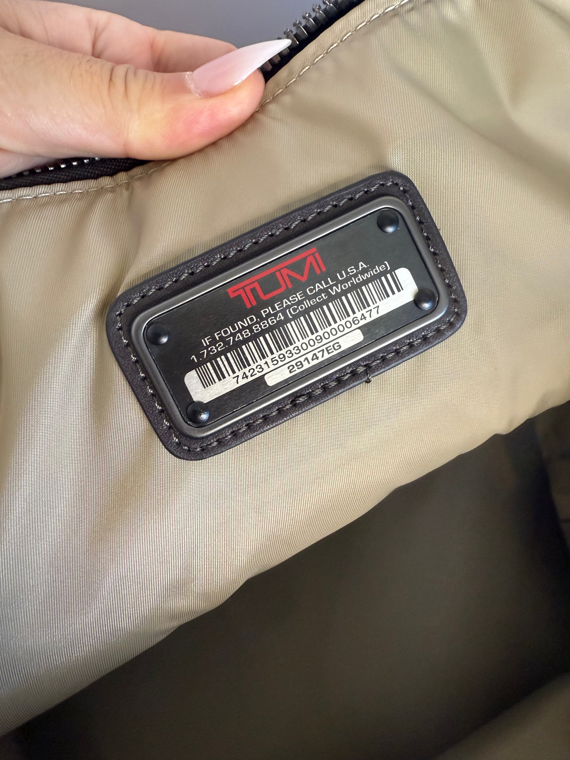 TUMI overnight bag with leather trim