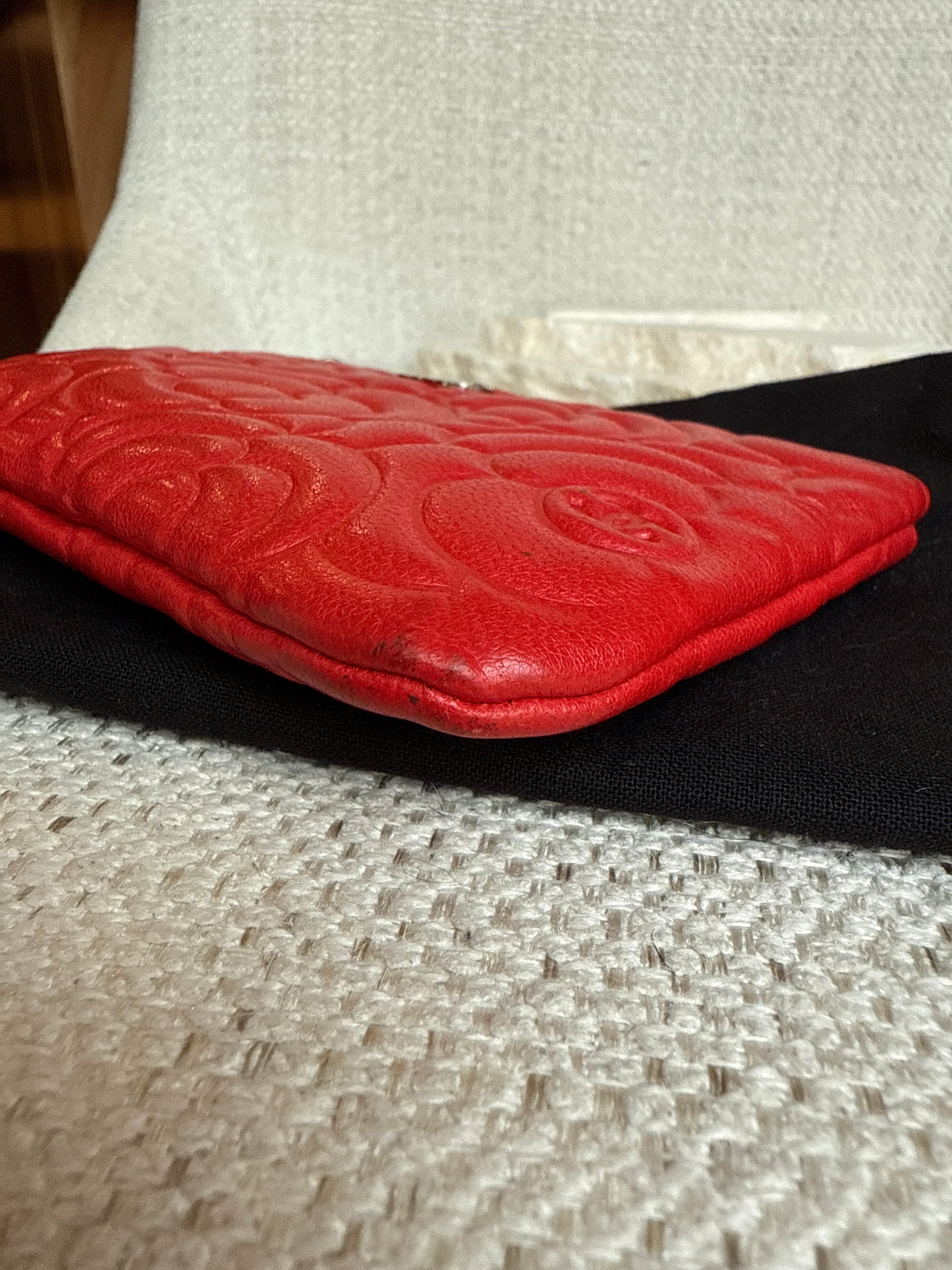 Chanel red leather camellia embossed case pouch