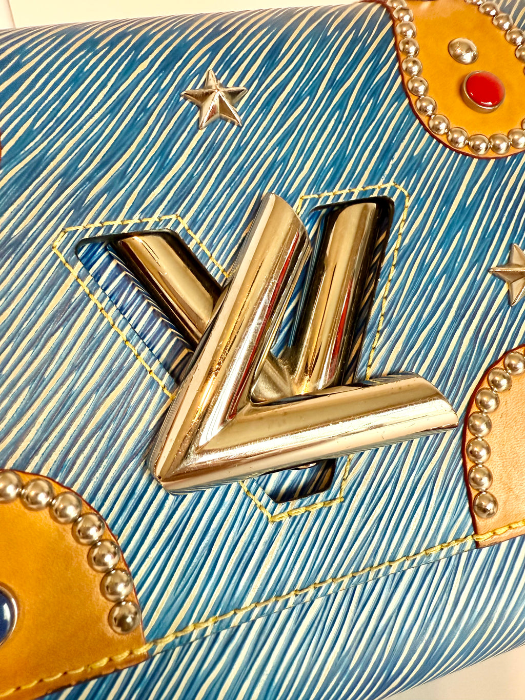 Louis Vuitton epi and vachetta crossbody twist lock