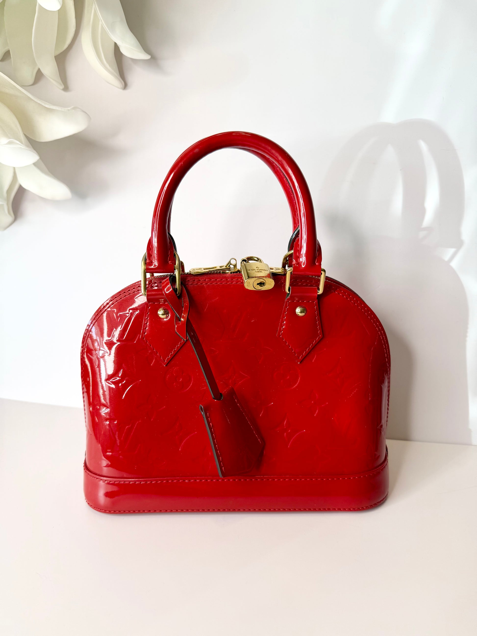 Louis Vuitton Alma BB bag in glossy red Vernis