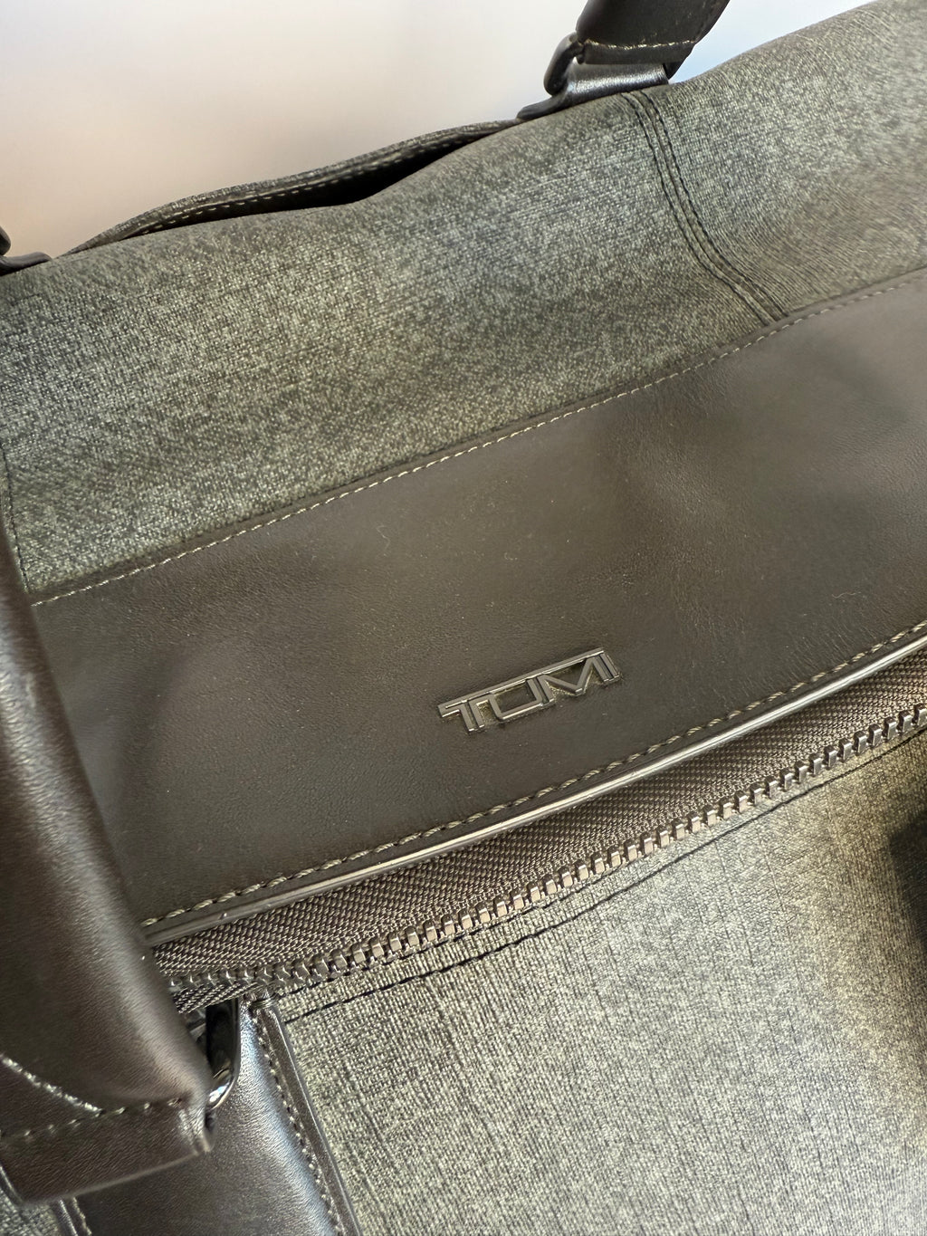 TUMI overnight bag with leather trim