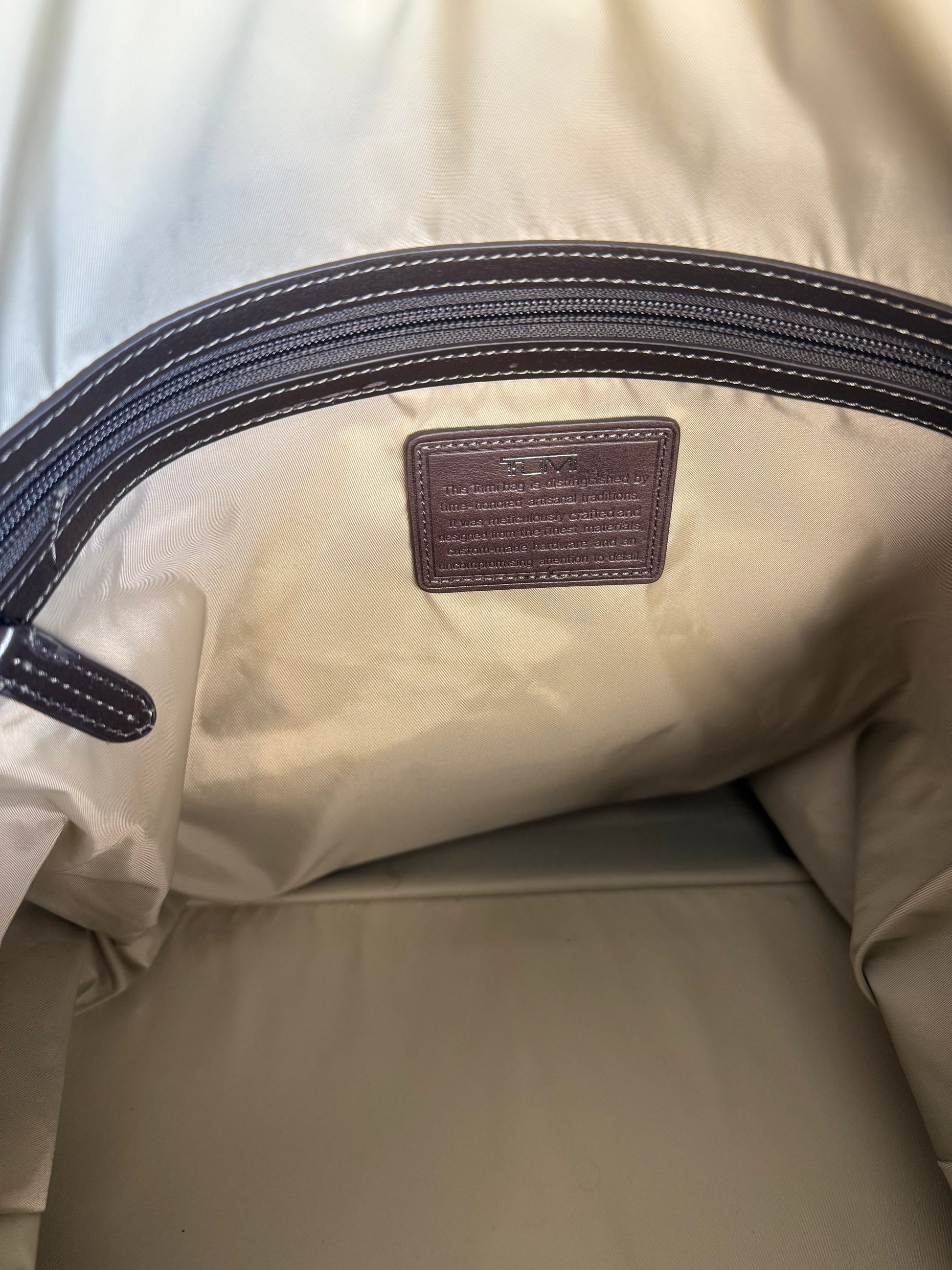 TUMI overnight bag with leather trim