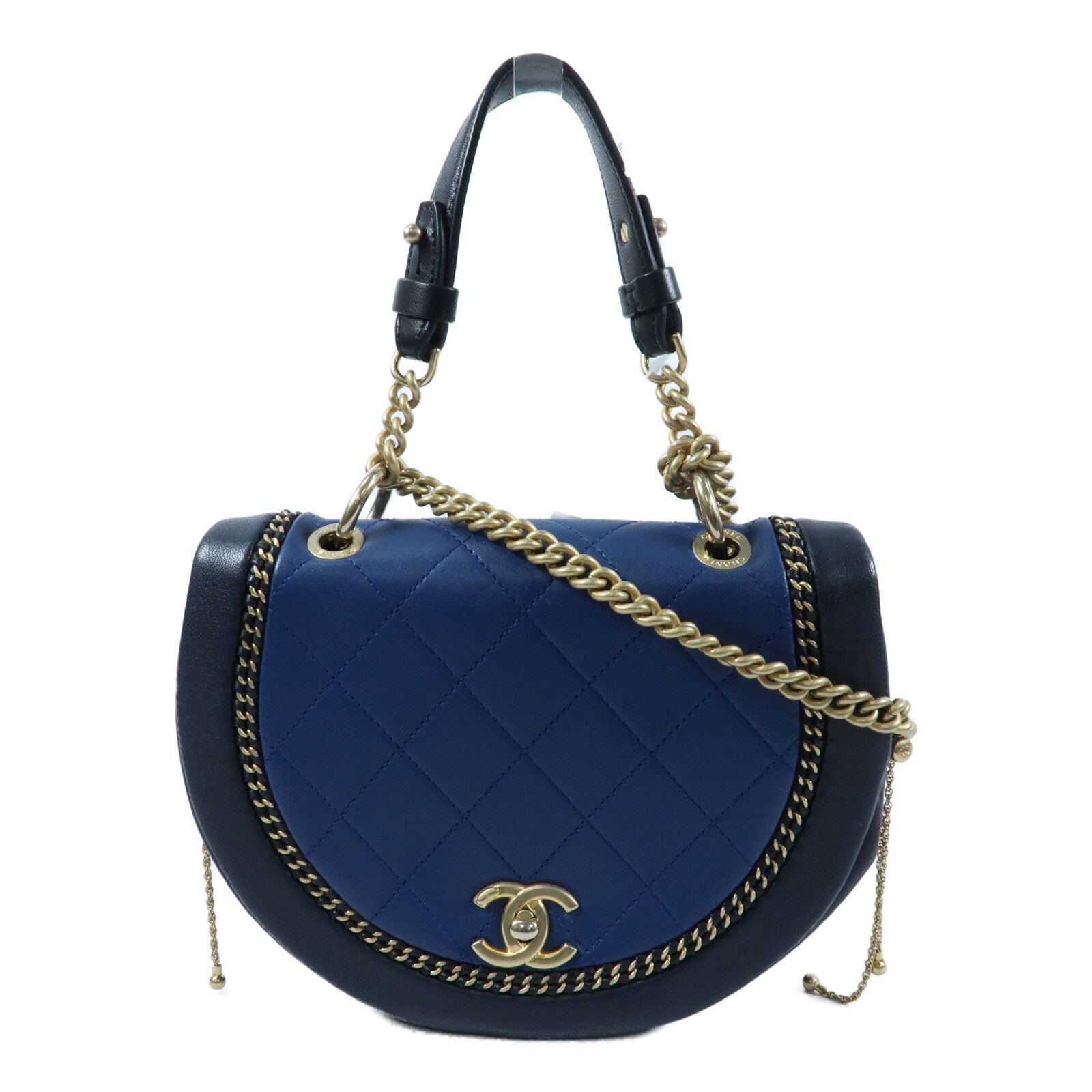 Chanel small quilted two-tone calfskin saddle bag with chain detail