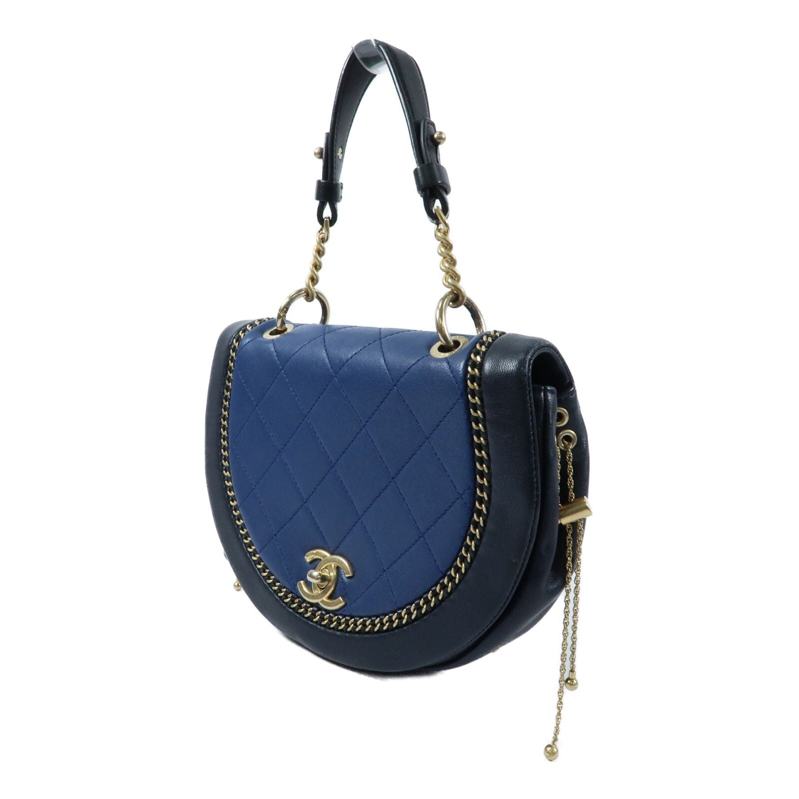 Chanel small quilted two-tone calfskin saddle bag with chain detail