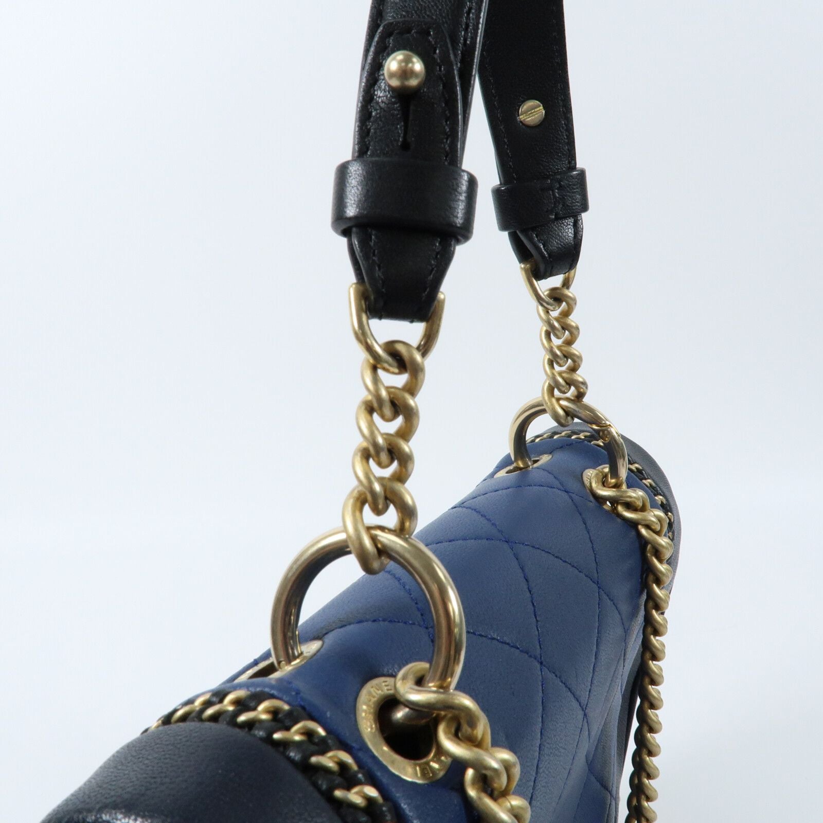 Chanel small quilted two-tone calfskin saddle bag with chain detail