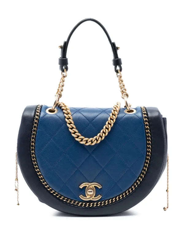 Chanel small quilted two-tone calfskin saddle bag with chain detail