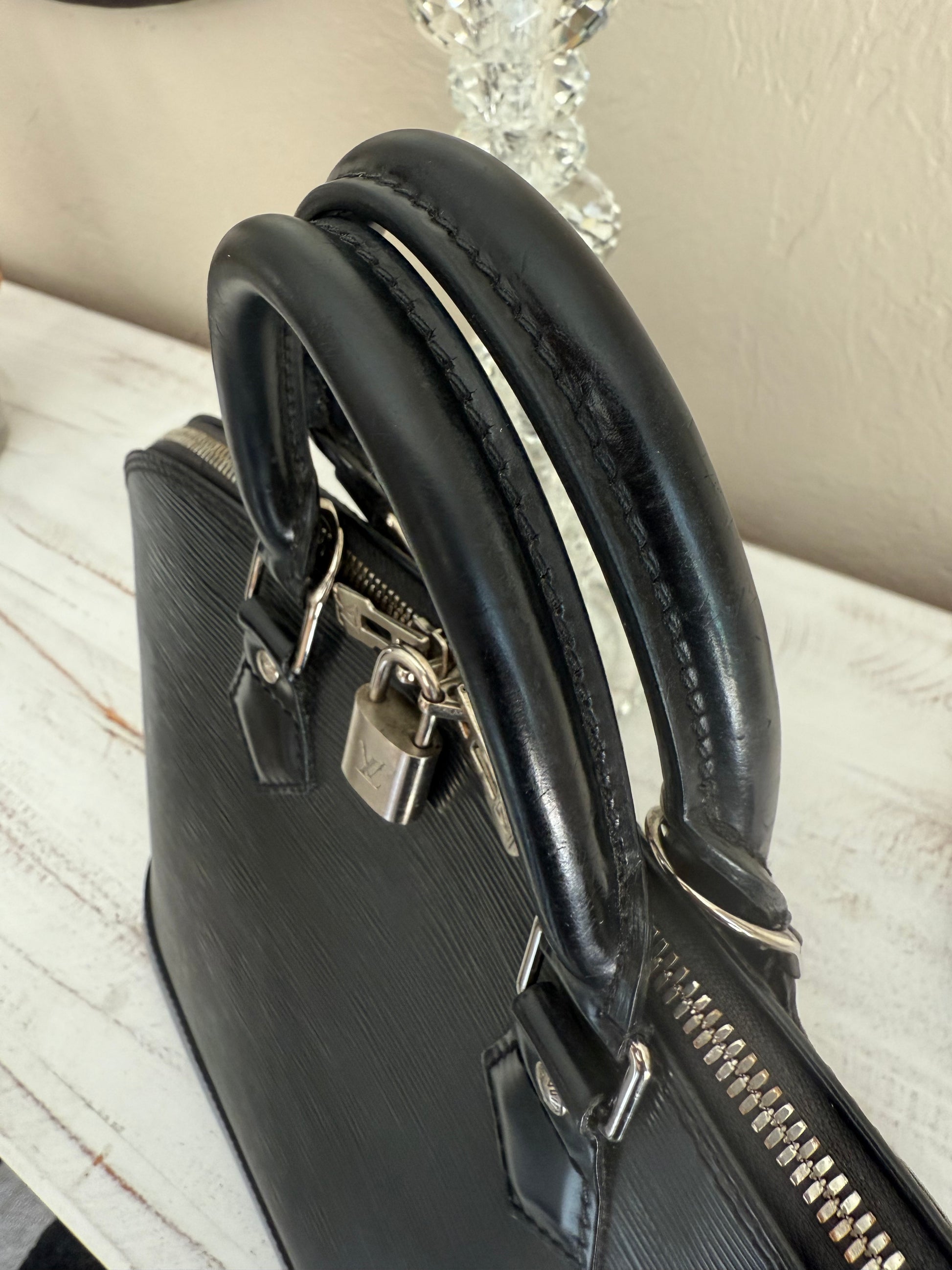 Louis Vuitton Epi Alma silver