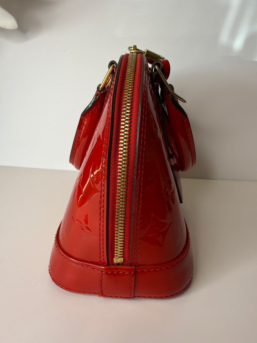 Louis Vuitton Alma BB bag in glossy red Vernis