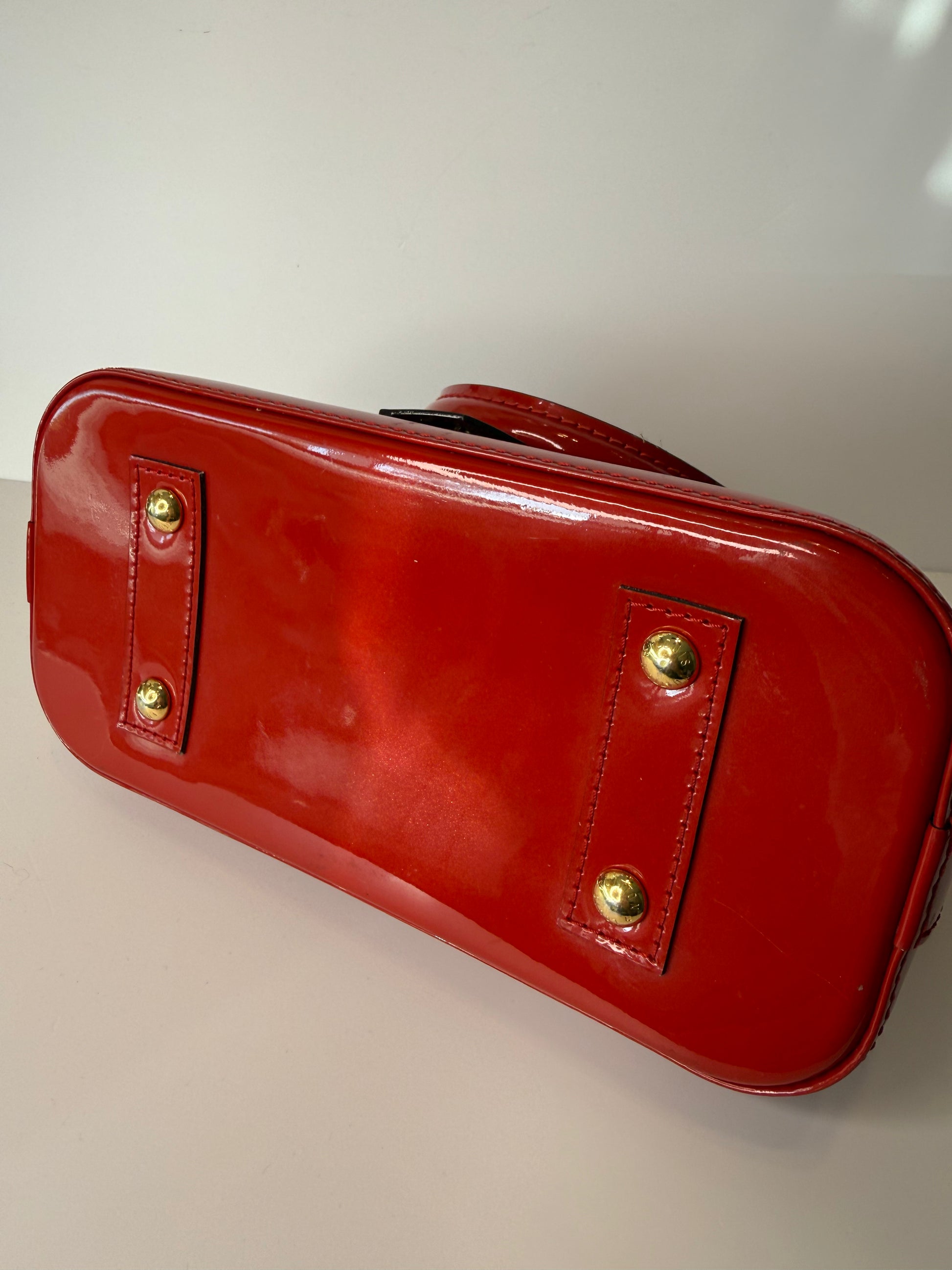 Louis Vuitton Alma BB bag in glossy red Vernis