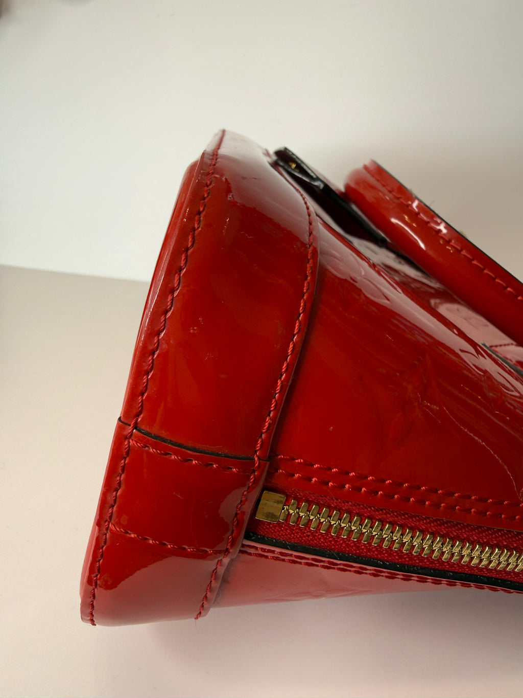 Louis Vuitton Alma BB bag in glossy red Vernis