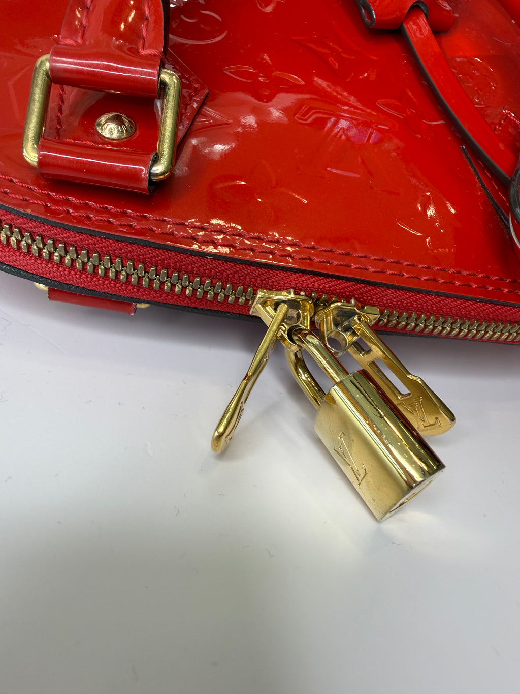 Louis Vuitton Alma BB bag in glossy red Vernis