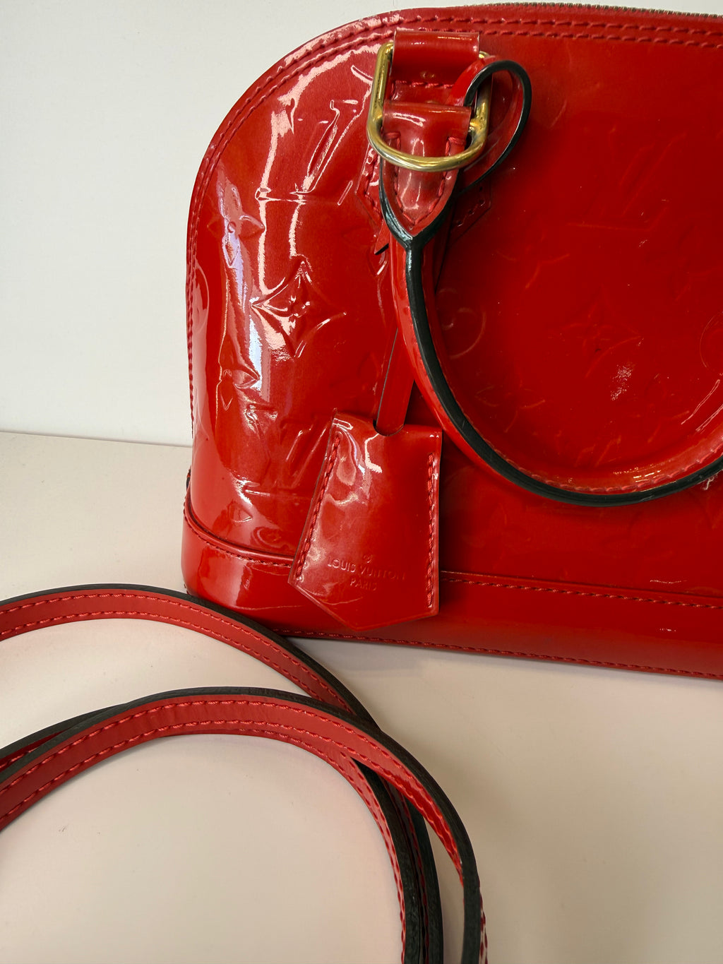 Louis Vuitton Alma BB bag in glossy red Vernis