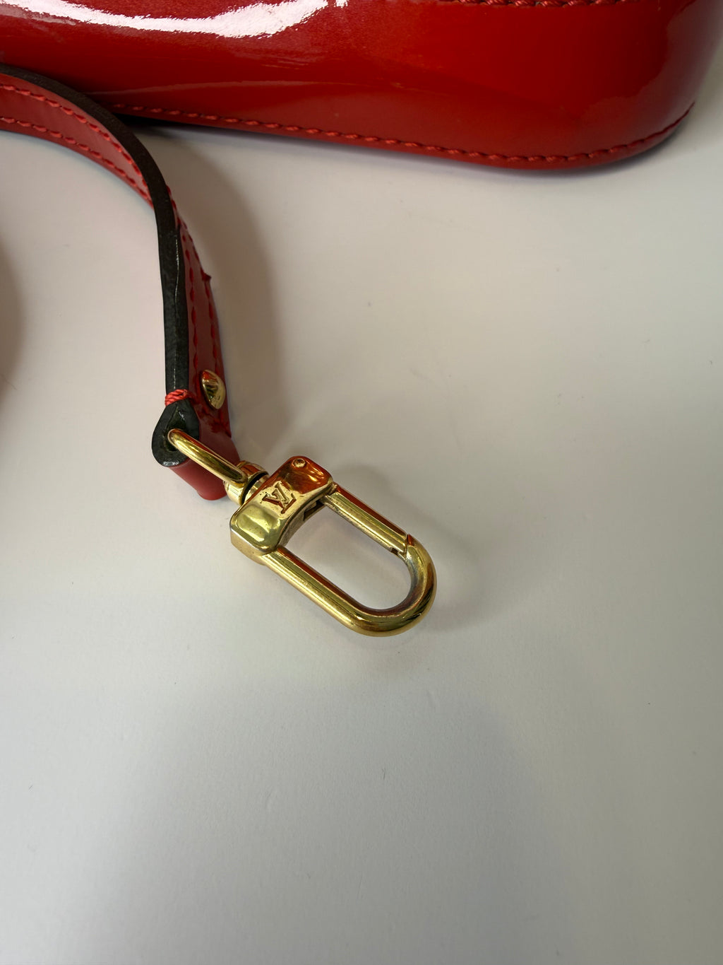 Louis Vuitton Alma BB bag in glossy red Vernis