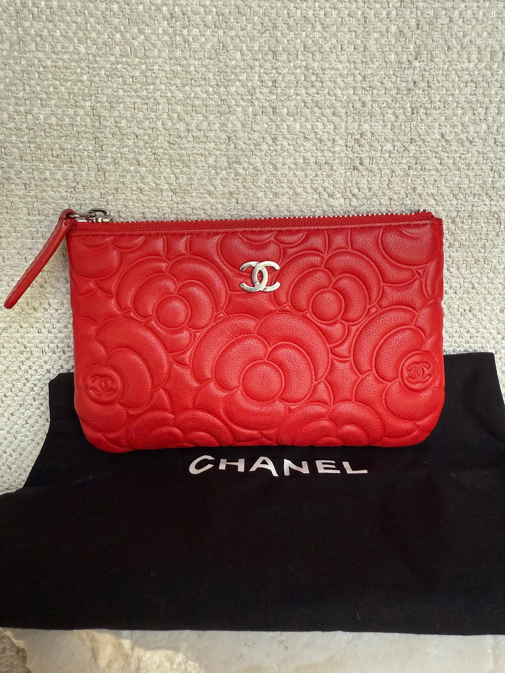Chanel red leather camellia embossed case pouch