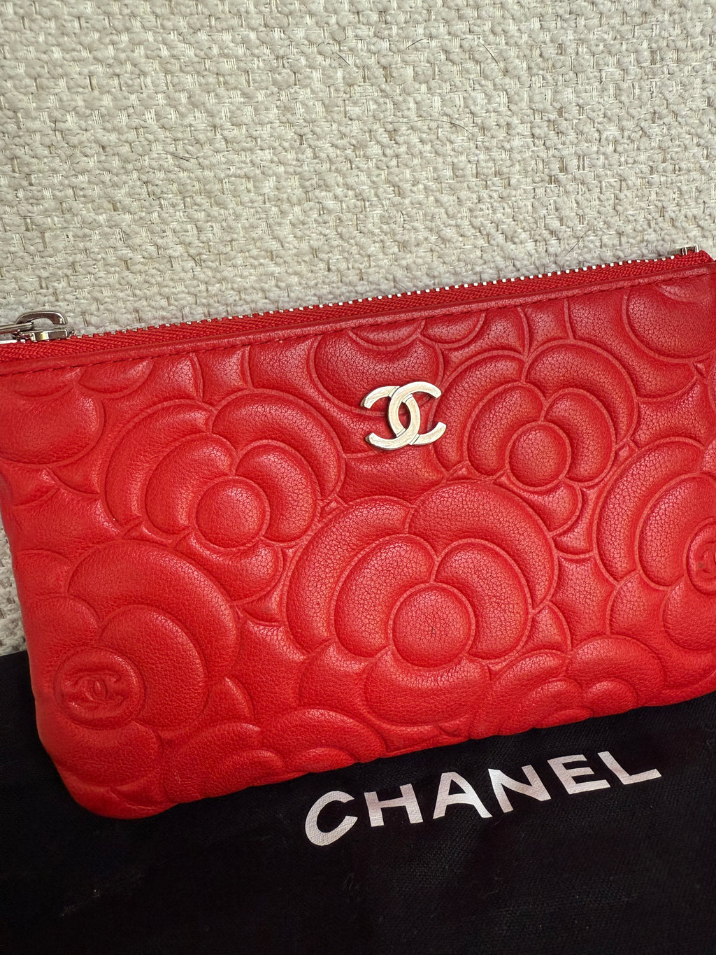 Chanel red leather camellia embossed case pouch