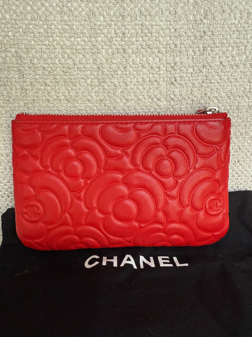Chanel red leather camellia embossed case pouch
