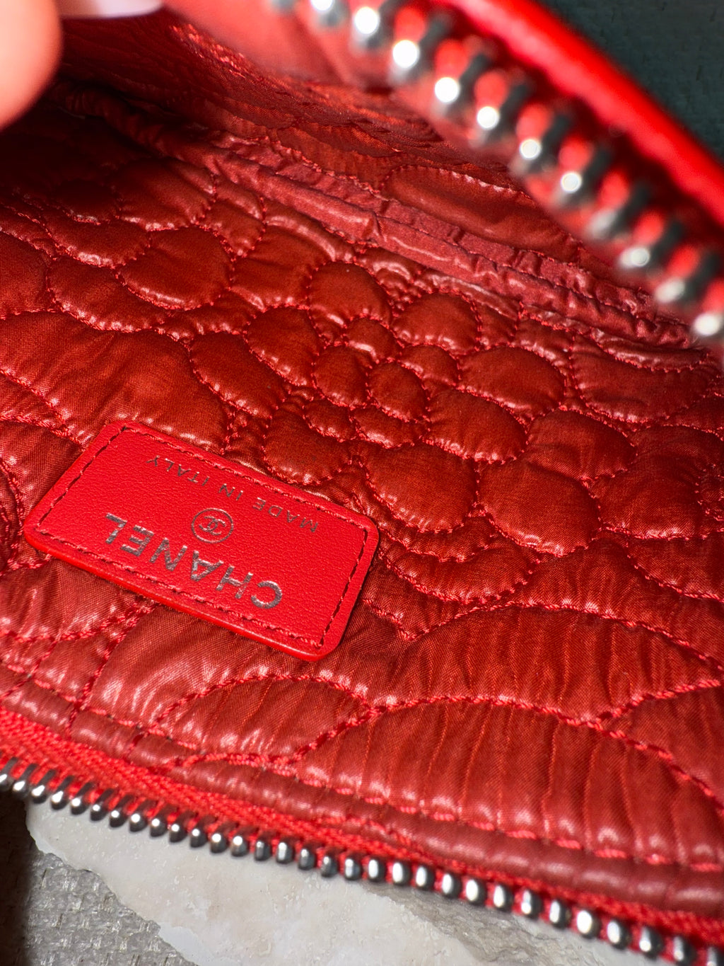 Chanel red leather camellia embossed case pouch