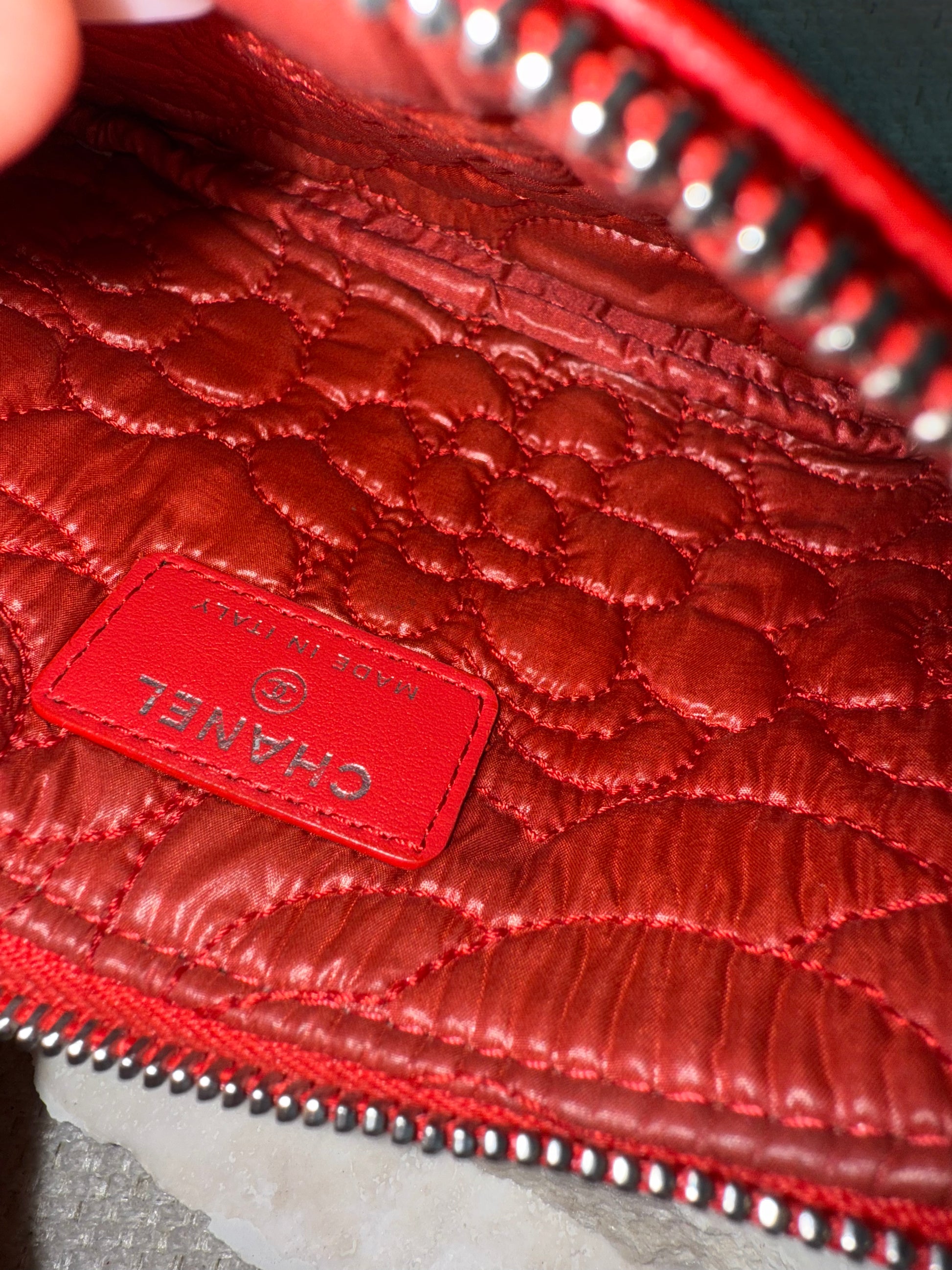 Chanel red leather camellia embossed case pouch